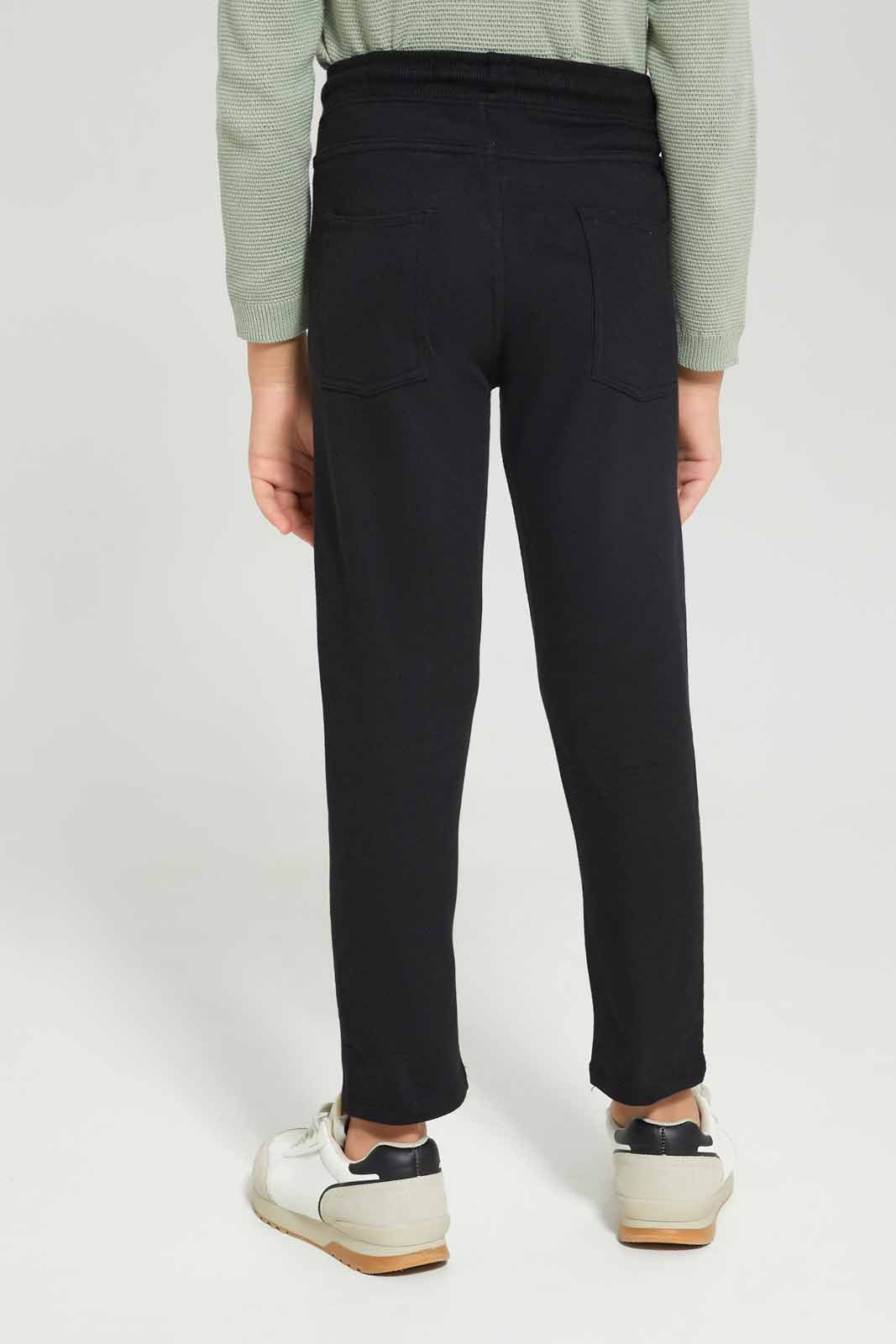 Redtag-Boys-Black-5-Pocket-Stretch-Pant-BOY-Trousers,-BTS,-Category:Trousers,-Colour:Black,-Deals:New-In,-Dept:Boys,-Filter:Boys-(2-to-8-Yrs),-New-In-BOY-APL,-Non-Sale,-S23A,-Section:Boys-(0-to-14Yrs),-VLM-Boys-2 to 8 Years