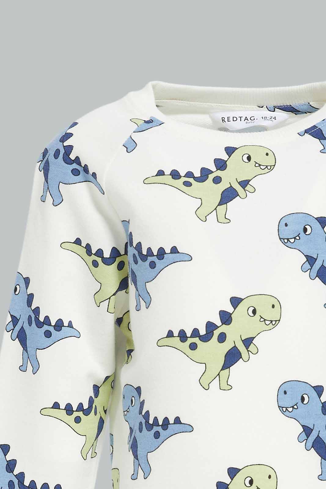 Redtag-Boys-Cream-Top-With-Green-Bottom-Dino-Aop-Crew-Jogging-Suit-Category:Jog-Sets,-Colour:Cream,-Deals:New-In,-Dept:Boys,-Filter:Infant-Boys-(3-to-24-Mths),-INB-Jog-Sets,-New-In-INB-APL,-Non-Sale,-S23A,-Section:Boys-(0-to-14Yrs)-Infant-Boys-3 to 24 Months