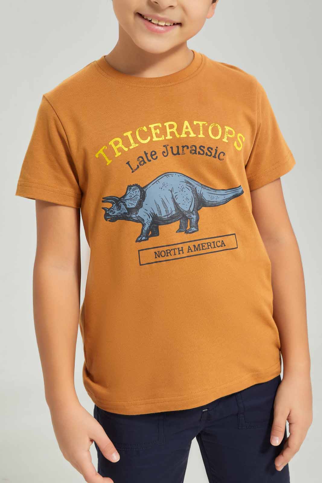 Redtag-Boys-Brown-Dino-Graphic-Short-Sleeve-T-Shirt-BOY-T-Shirts,-Category:T-Shirts,-Colour:Brown,-Deals:New-In,-Dept:Boys,-Filter:Boys-(2-to-8-Yrs),-New-In-BOY-APL,-Non-Sale,-S23A,-Section:Boys-(0-to-14Yrs),-TBL-Boys-2 to 8 Years