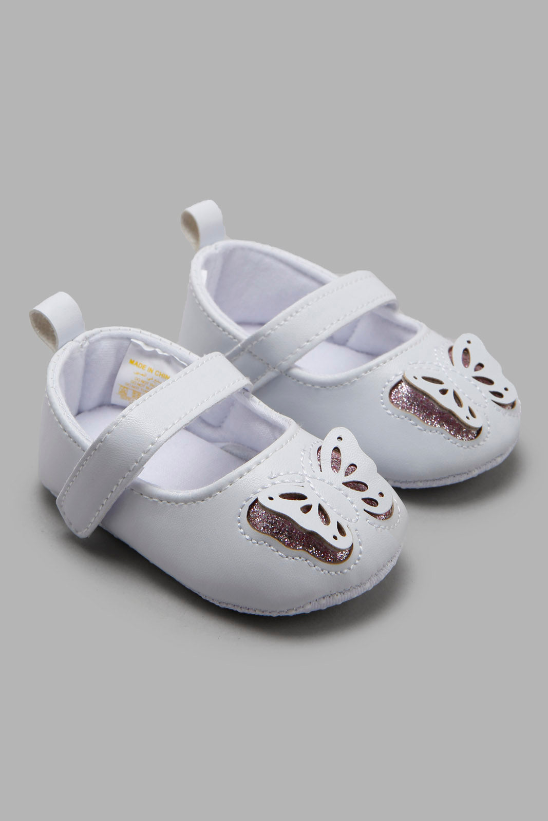 Redtag-White-Pram-Shoe-With-Butterfly-Trim-Category:Shoes,-Colour:White,-Deals:New-In,-Filter:Baby-Footwear-(0-to-18-Mths),-NBF-Shoes,-New-In-NBF-FOO,-Non-Sale,-Section:Boys-(0-to-14Yrs),-W22A-Baby-0 to 18 Months