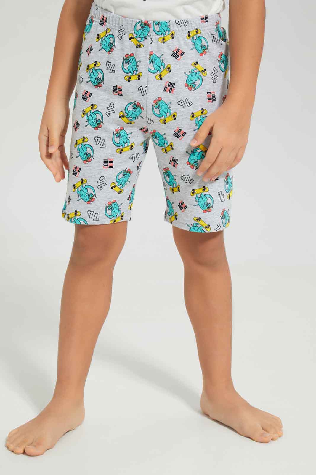 Redtag-Boys-White-Dino-Short-Sleeve-Graphic-Tee-And-Aop-Shorts-Pyjama-Set-BOY-Pyjama-Sets,-Category:Pyjama-Sets,-Colour:White,-Deals:New-In,-Dept:Boys,-Filter:Boys-(2-to-8-Yrs),-New-In-BOY-APL,-Non-Sale,-S23A,-Section:Boys-(0-to-14Yrs),-VLM-Boys-2 to 8 Years