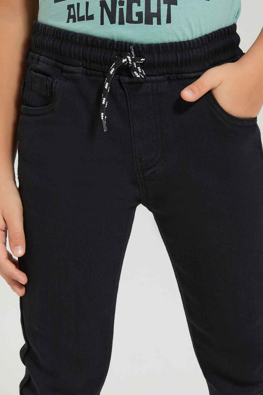 Redtag-Boys-Black-Elasticated-Waist-Jogger-Jean-BOY-Jeans,-Category:Jeans,-Colour:Black,-Deals:New-In,-Dept:Boys,-Filter:Boys-(2-to-8-Yrs),-FIT-WALL-(FTW),-New-In-BOY-APL,-Non-Sale,-S23A,-Section:Boys-(0-to-14Yrs)-Boys-2 to 8 Years