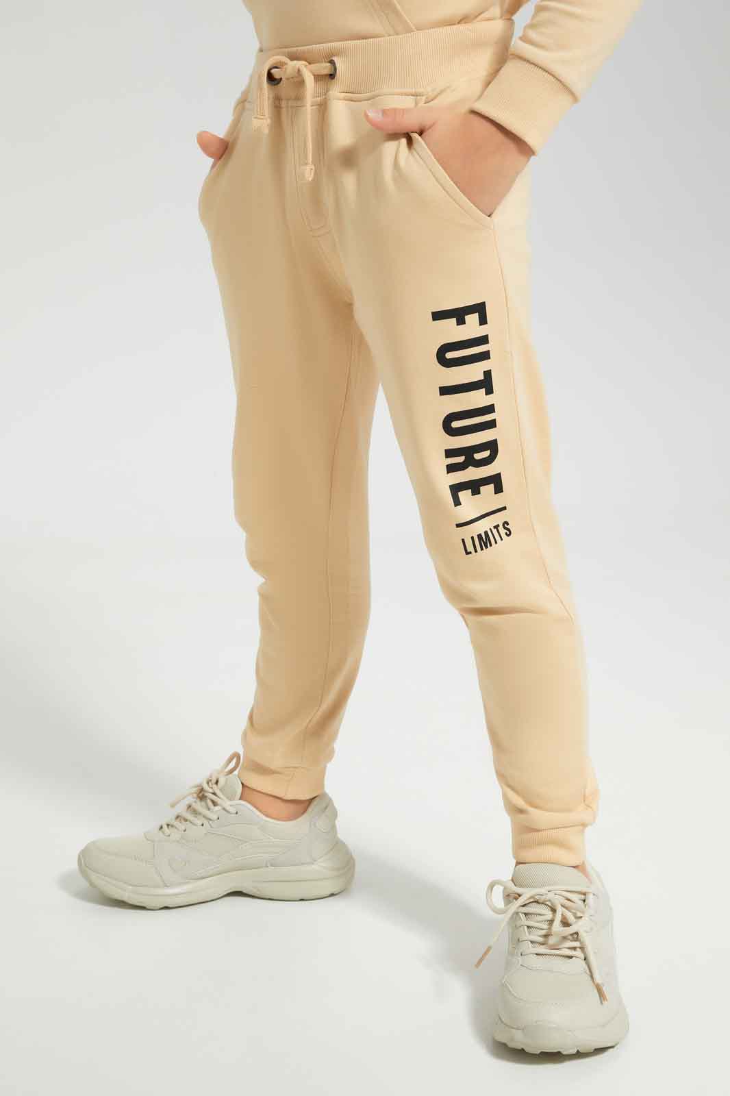 Redtag-Boys-Beige-Printed-Hooded-Jogsuit-BOY-Jog-Sets,-Category:Jog-Sets,-Colour:Beige,-Deals:New-In,-Dept:Boys,-Filter:Boys-(2-to-8-Yrs),-New-In-BOY-APL,-Non-Sale,-S23A,-Section:Boys-(0-to-14Yrs)-Boys-2 to 8 Years