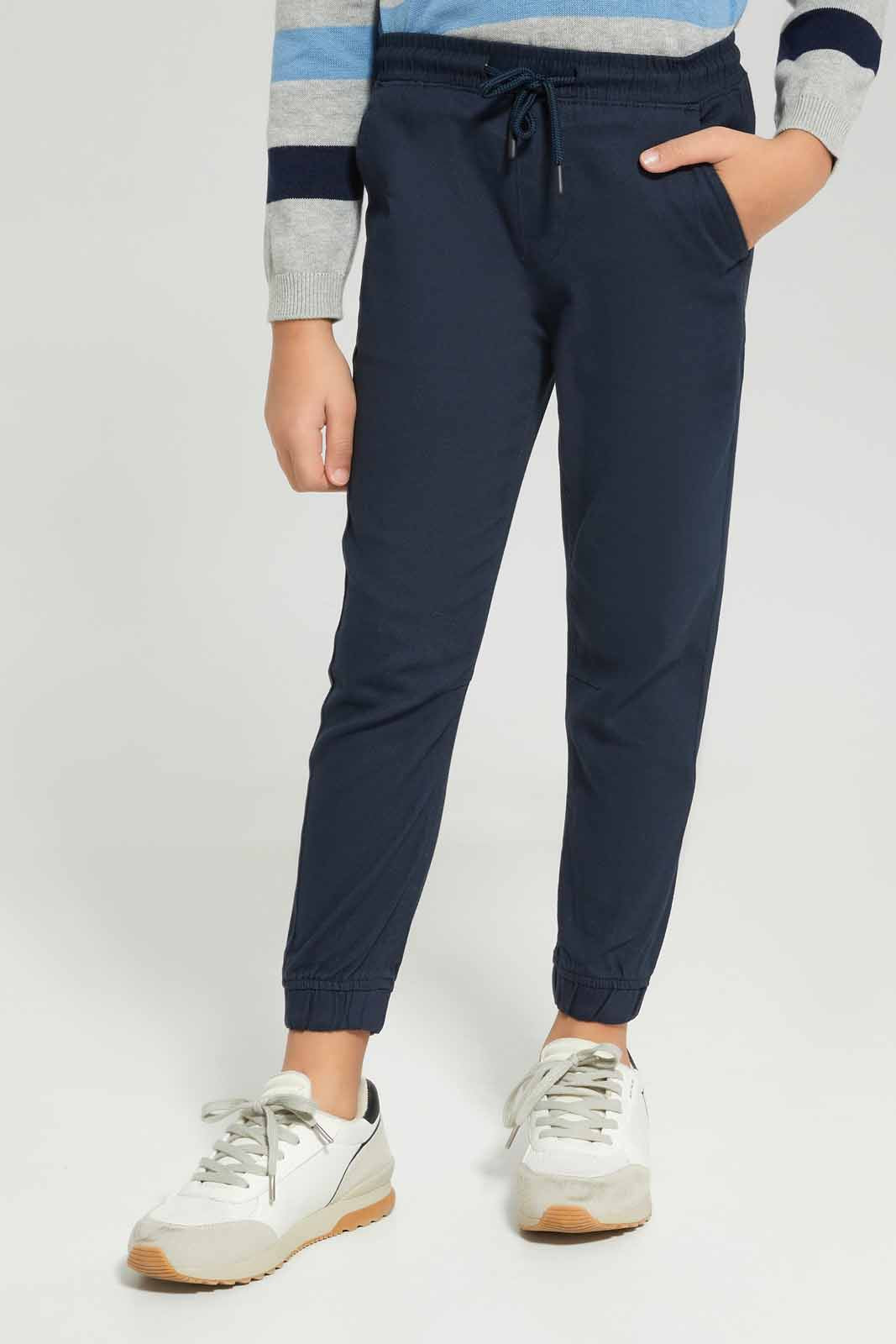 Redtag-Boys-Navy-Elasticated-Waist-Jogger-BOY-Trousers,-Category:Trousers,-Colour:Navy,-Deals:New-In,-Dept:Boys,-Filter:Boys-(2-to-8-Yrs),-New-In-BOY-APL,-Non-Sale,-S23A,-Section:Boys-(0-to-14Yrs),-VLM-Boys-2 to 8 Years
