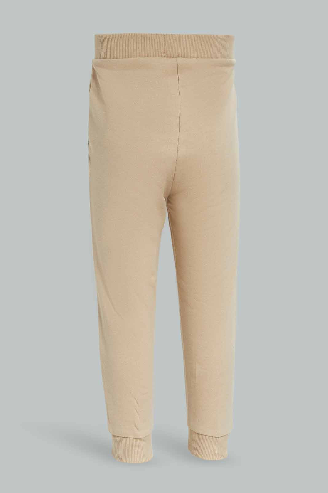Redtag-Boys-Stone-Plain-Knit-Joggers-Category:Joggers,-Colour:Beige,-Deals:New-In,-Dept:Boys,-Filter:Infant-Boys-(3-to-24-Mths),-INB-Joggers,-New-In-INB-APL,-Non-Sale,-S23A,-Section:Boys-(0-to-14Yrs)-Infant-Boys-3 to 24 Months
