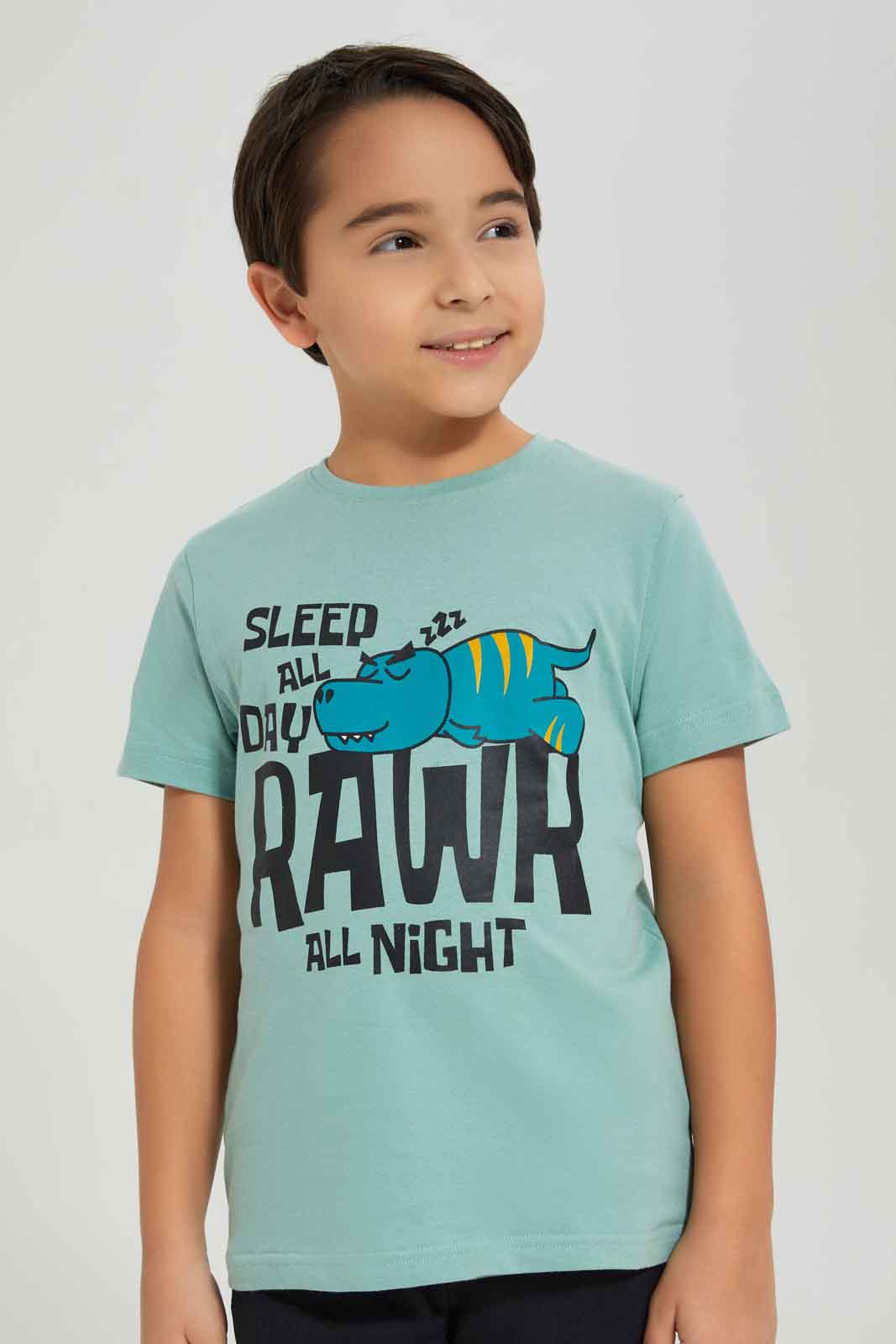 Redtag-Boys-Olive-Dino-Short-Sleeve-Graphic-T-Shirt-BOY-T-Shirts,-Category:T-Shirts,-Colour:Olive,-Deals:New-In,-Dept:Boys,-Filter:Boys-(2-to-8-Yrs),-New-In-BOY-APL,-Non-Sale,-S23A,-Section:Boys-(0-to-14Yrs),-TBL-Boys-2 to 8 Years