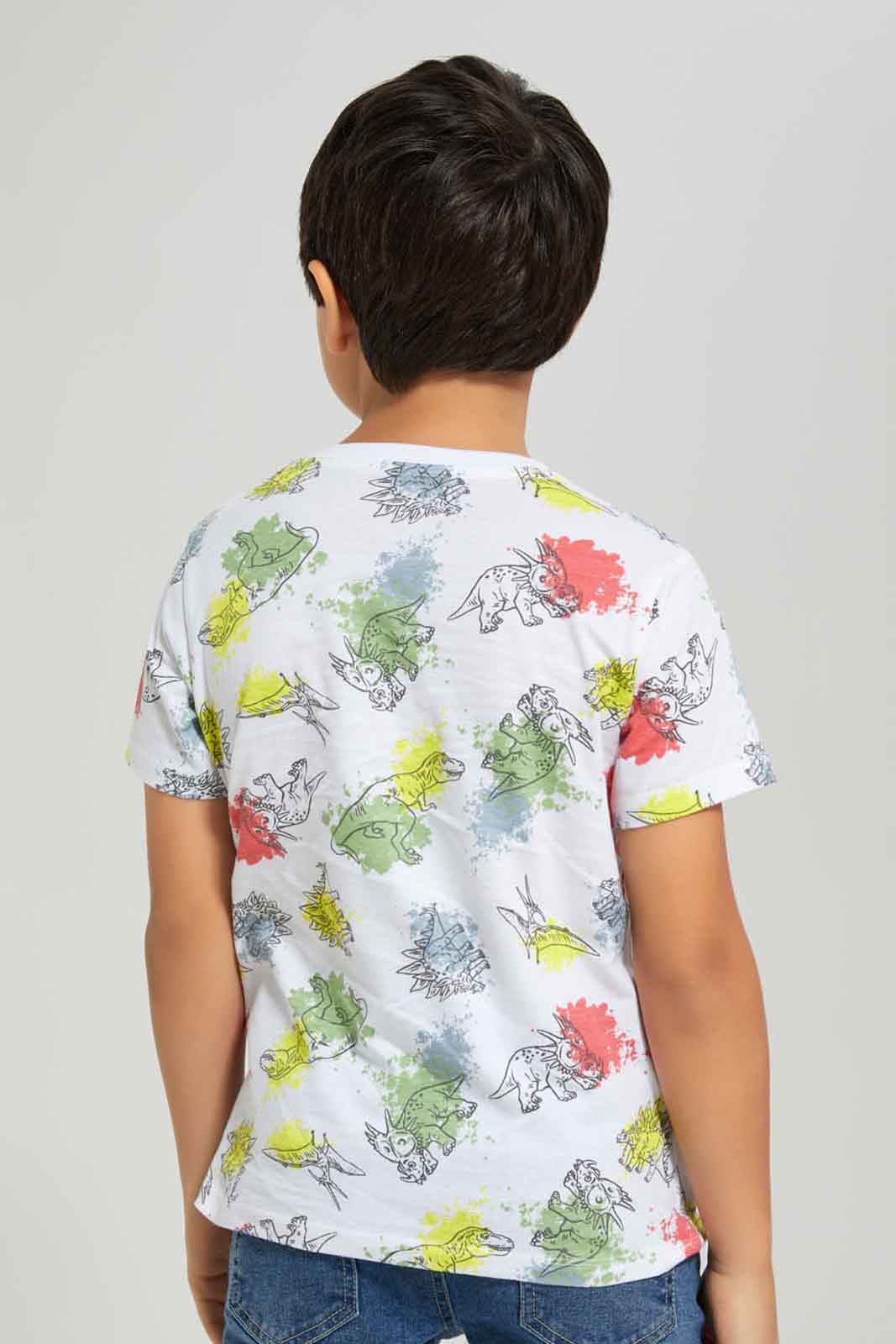 Redtag-Boys-White-Dino-Short-Sleeve-Aop-T-Shirt-BOY-T-Shirts,-Category:T-Shirts,-Colour:White,-Deals:New-In,-Dept:Boys,-Filter:Boys-(2-to-8-Yrs),-New-In-BOY-APL,-Non-Sale,-S23A,-Section:Boys-(0-to-14Yrs),-TBL-Boys-2 to 8 Years