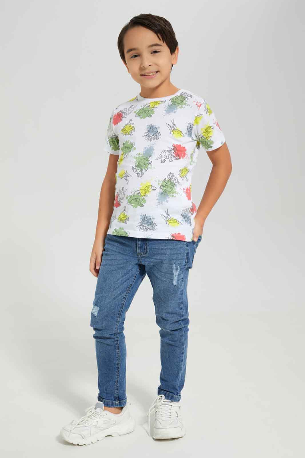 Redtag-Boys-White-Dino-Short-Sleeve-Aop-T-Shirt-BOY-T-Shirts,-Category:T-Shirts,-Colour:White,-Deals:New-In,-Dept:Boys,-Filter:Boys-(2-to-8-Yrs),-New-In-BOY-APL,-Non-Sale,-S23A,-Section:Boys-(0-to-14Yrs),-TBL-Boys-2 to 8 Years