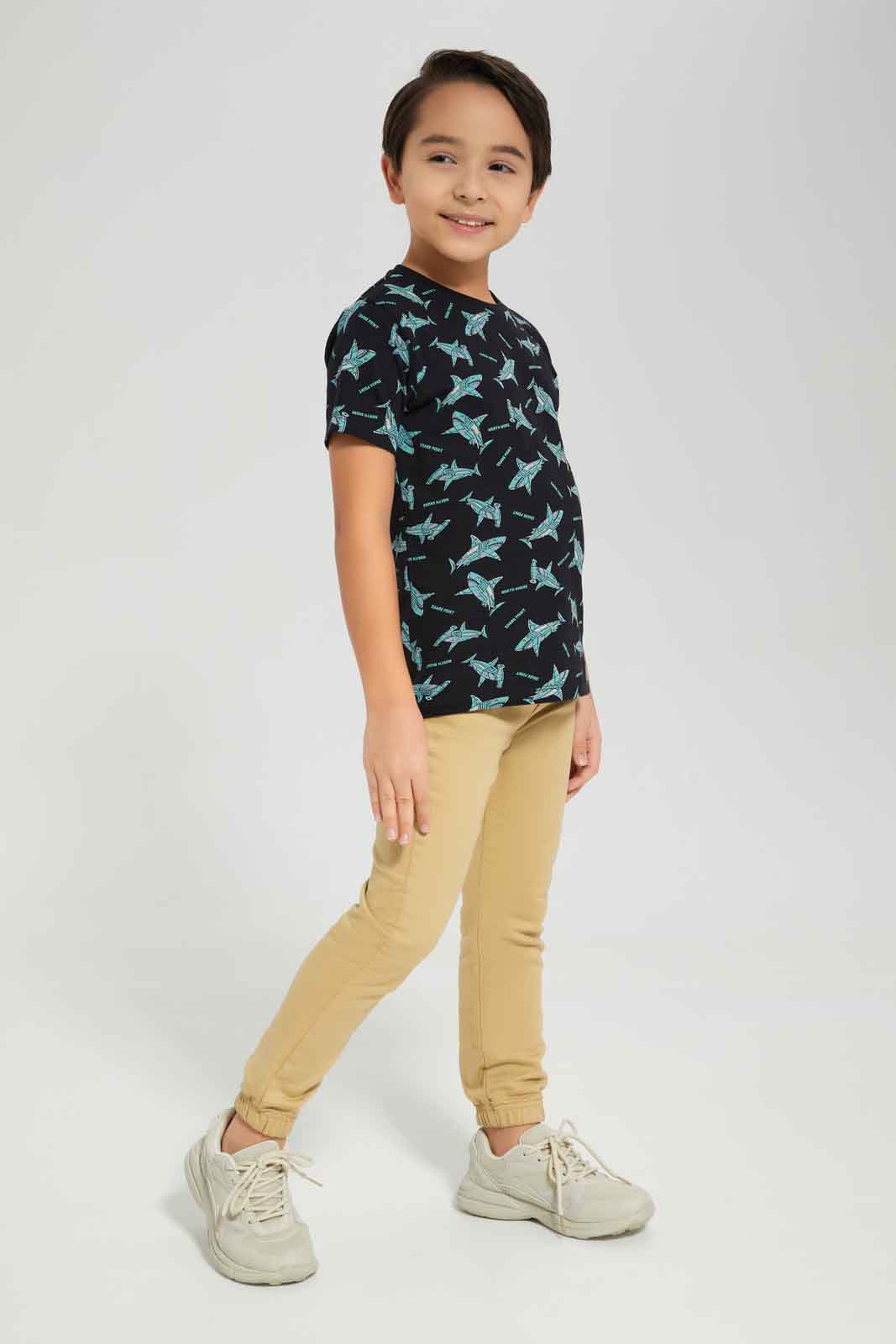 Redtag-Boys-Black-Shark-Short-Sleeve-Aop-T-Shirt-BOY-T-Shirts,-Category:T-Shirts,-Colour:Black,-Deals:New-In,-Dept:Boys,-Filter:Boys-(2-to-8-Yrs),-New-In-BOY-APL,-Non-Sale,-S23A,-Section:Boys-(0-to-14Yrs),-TBL-Boys-2 to 8 Years